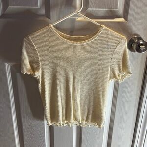 cream colored american eagle crop top